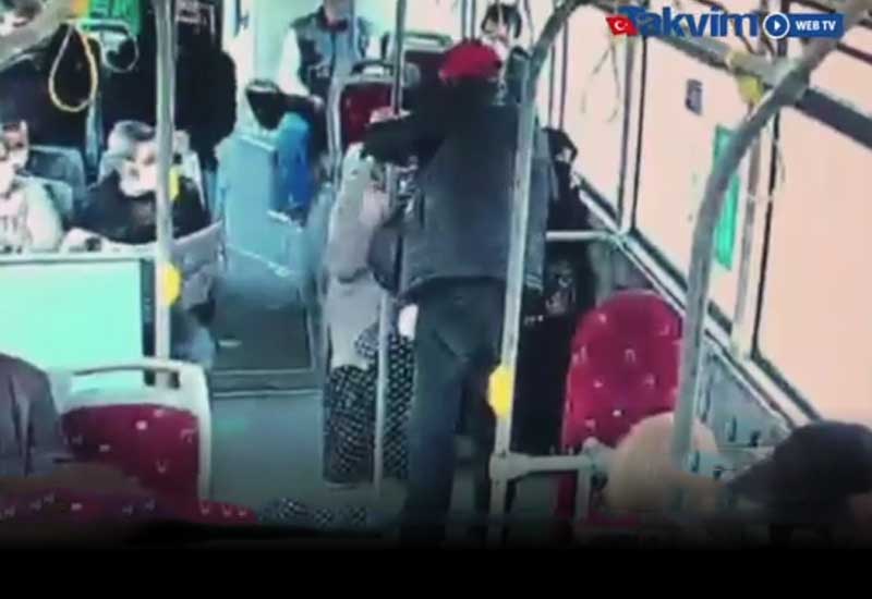 İzmirdə avtobusda hicablı qadına yumruqla vurdu - VİDEO
